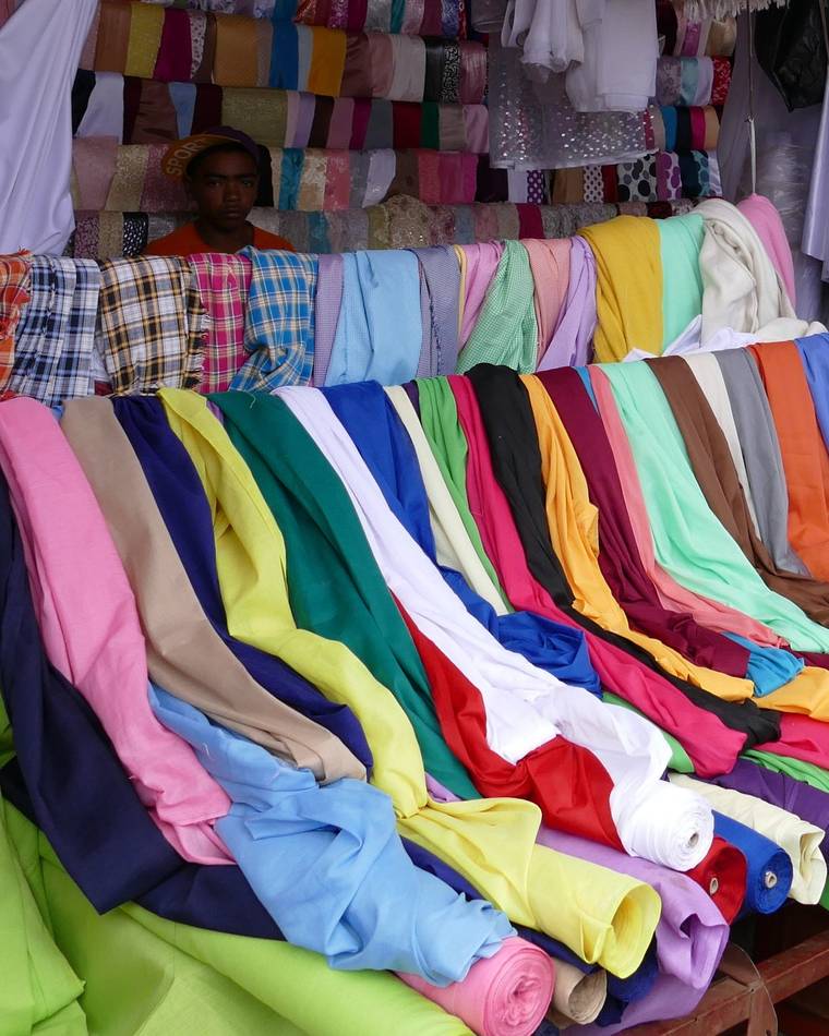 Rolls of colourful cotton fabric