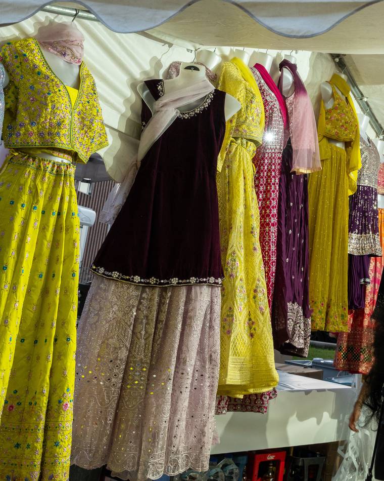 Embroidered outfits on display
