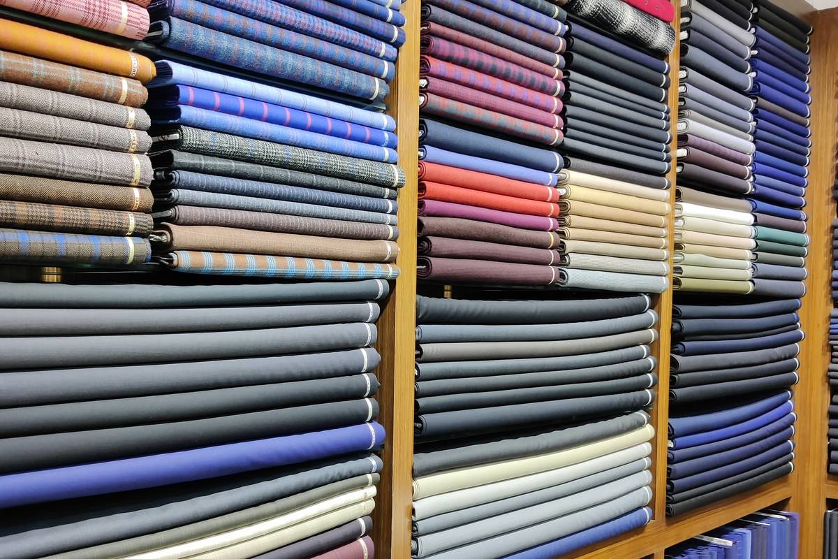 Shelves stacked with fabric
